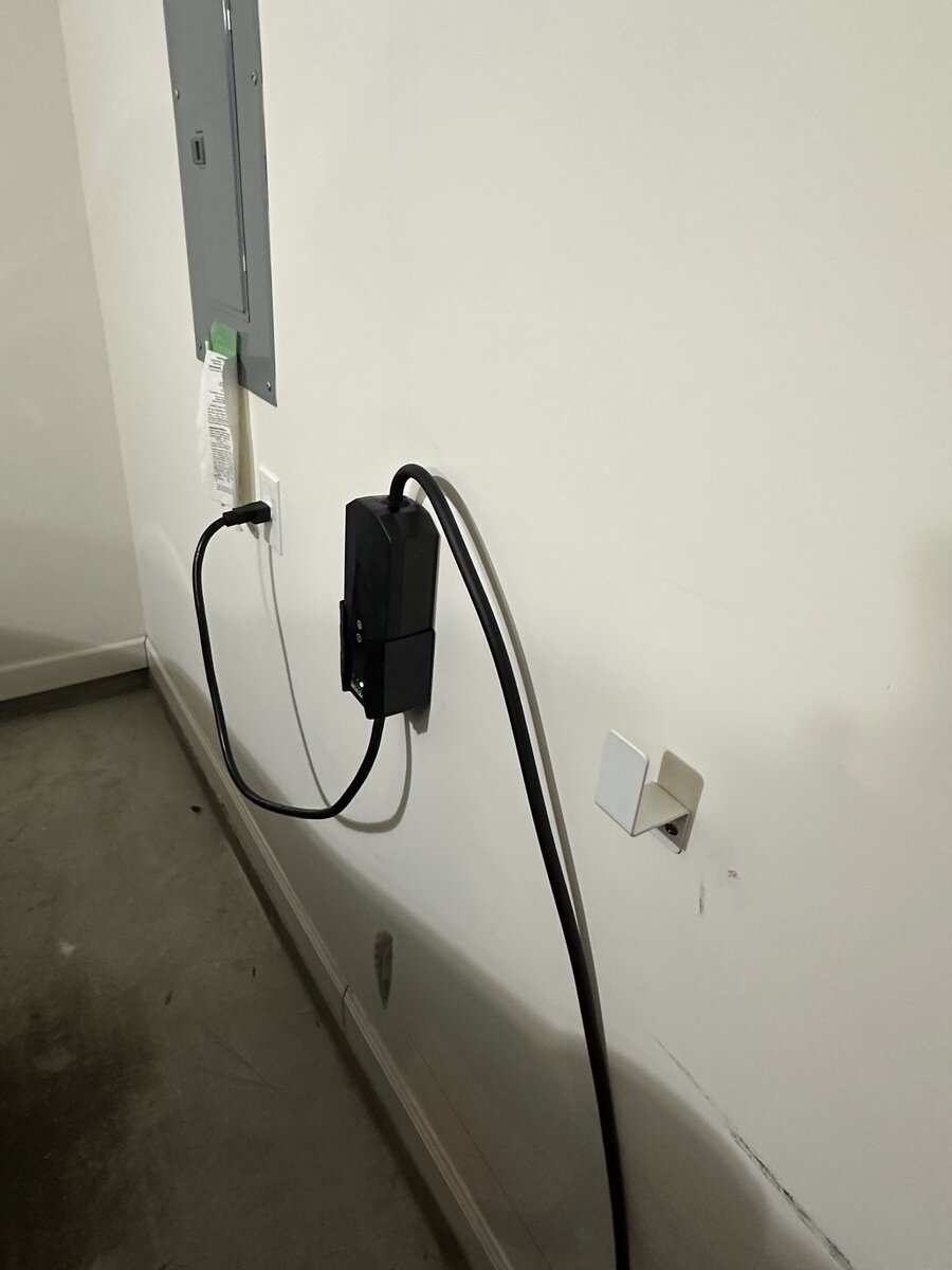 EV charging station with 240-volt outlet and conduit